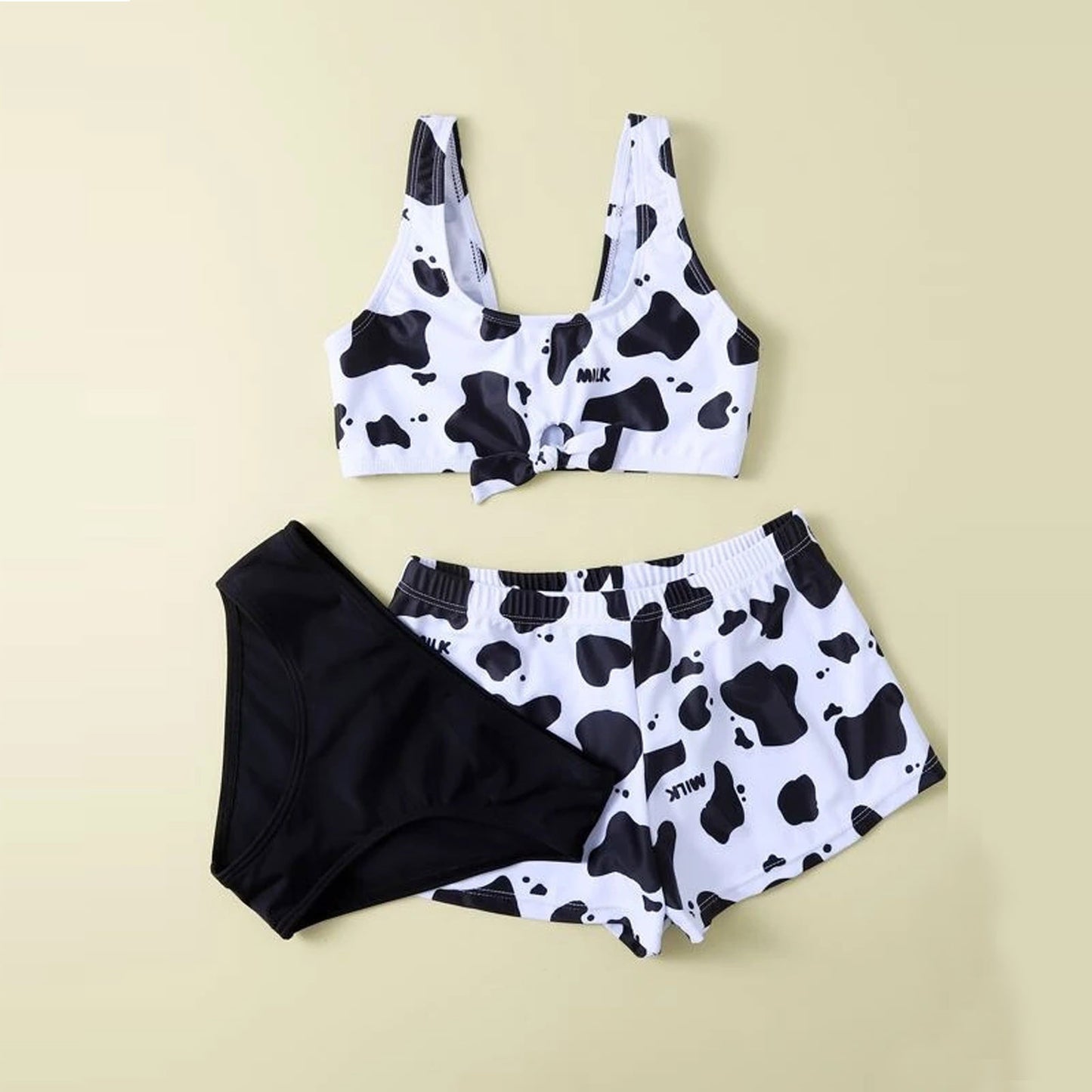 Playful cow-print split three-piece bikinis