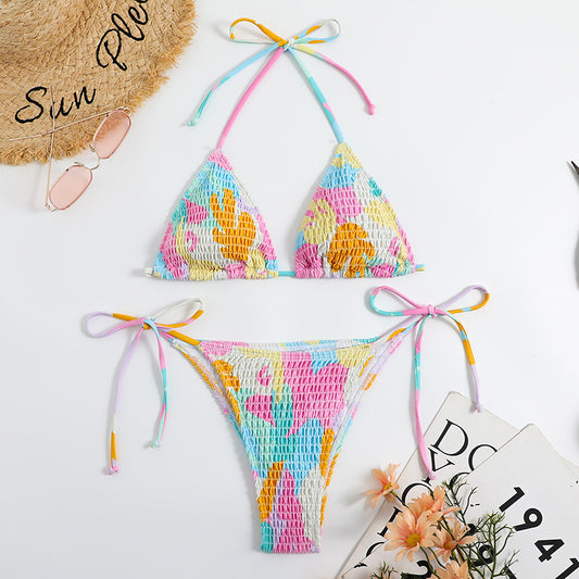 Playful printed smocked split triangle bikinis