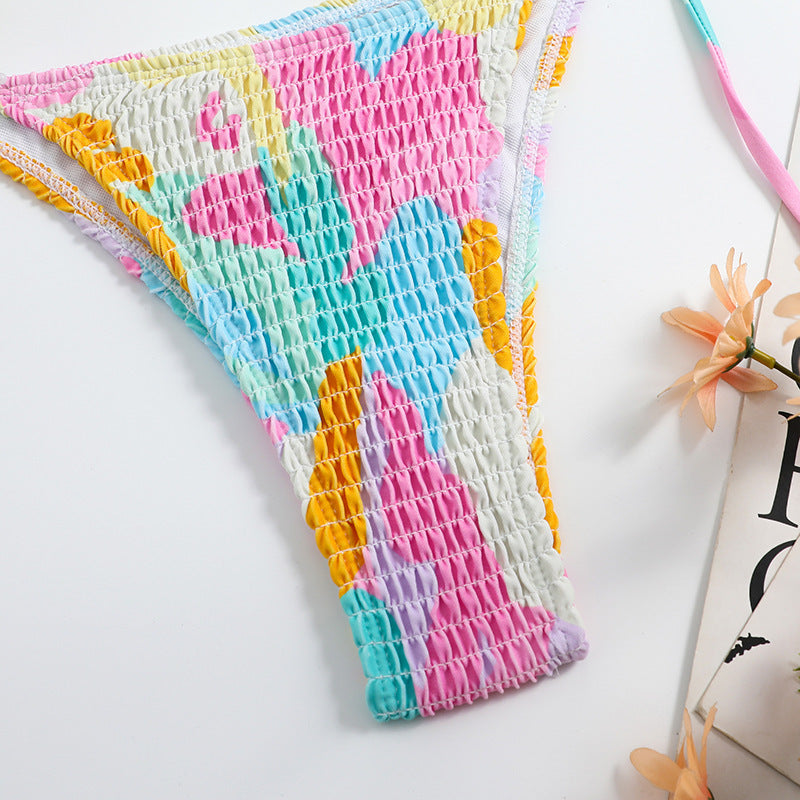 Playful printed smocked split triangle bikinis