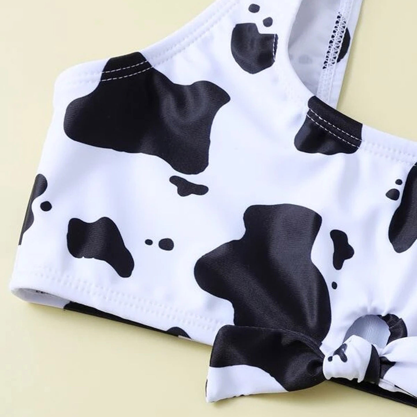 Playful cow-print split three-piece bikinis