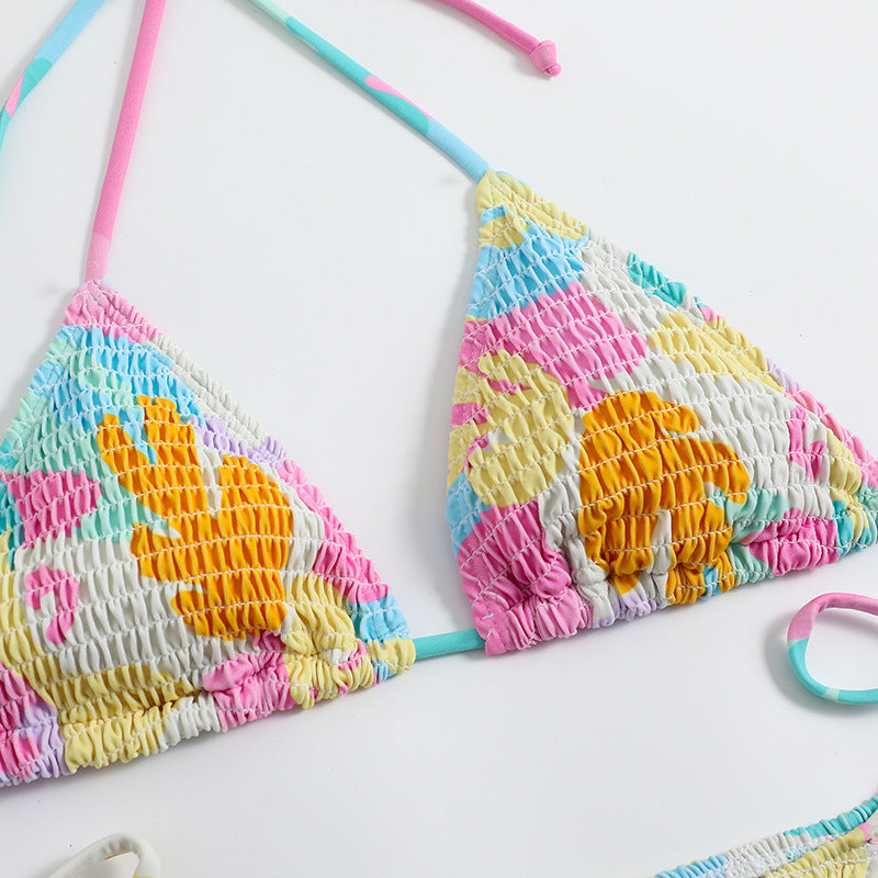 Playful printed smocked split triangle bikinis
