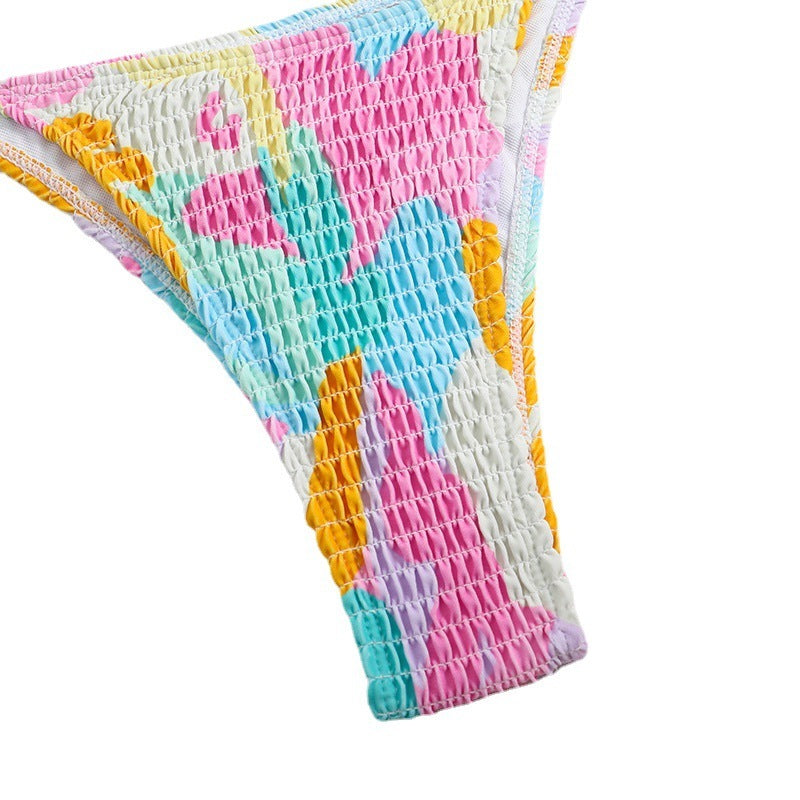 Playful printed smocked split triangle bikinis